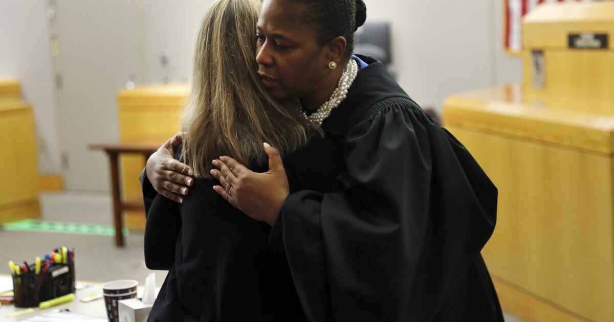 Judge says she couldn&rsquo;t refuse giving convicted former Dallas cop a hug