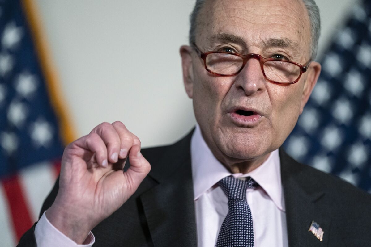 Senate Majority Leader Sen. Chuck Schumer of N.Y. speaks during a news conference on Capitol Hill, Tuesday, Feb. 1, 2022, in Washington. (AP Photo/Evan Vucci)