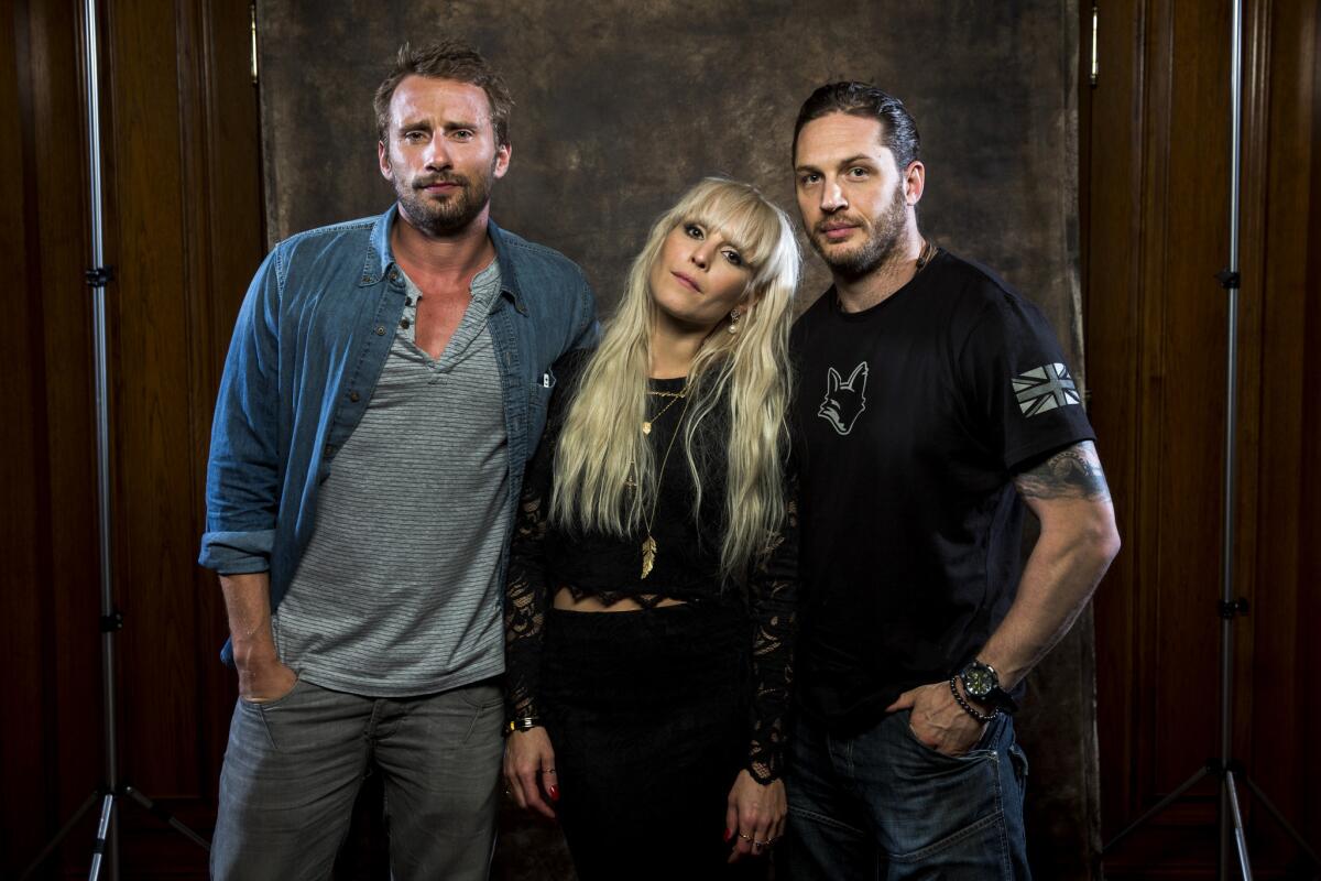 Matthias Schoenaerts, left, Noomi Rapace and Tom Hardy of "The Drop" are photographed at the Toronto International Film Festival.