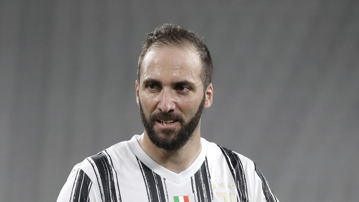 Juventus' Gonzalo Higuain looks on during a Serie A soccer match between Juventus and Roma.