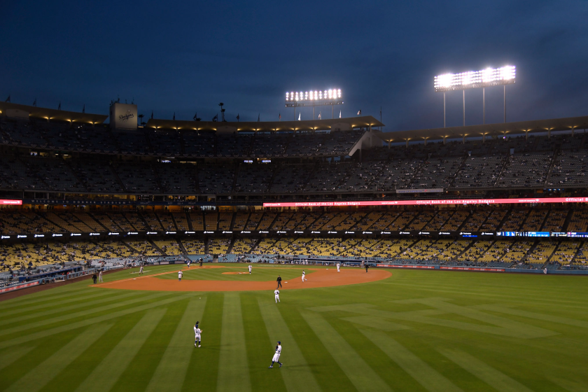 How life in California will change with June 15
reopening 5 LOS ANGELES, CALIFORNIA - APRIL 10: Zach McKinstry #8 of the Los Angeles Dodgers makes a catch.
