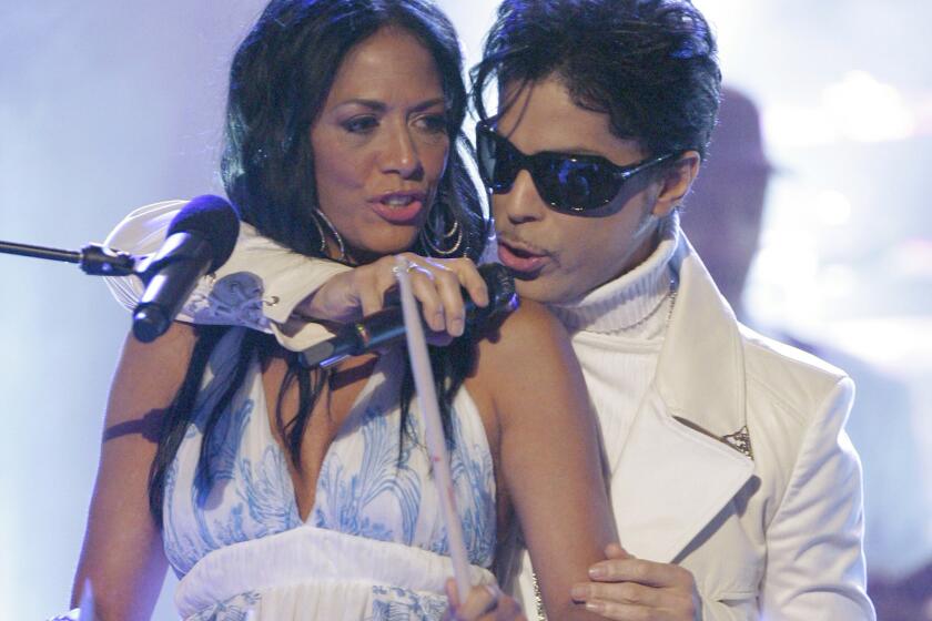 Prince performs with Sheila E. at the 2007 National Council of La Raza ALMA Awards in Pasadena. Sheila E. was a former close collaborator of Prince, who died Thursday at his home outside Minneapolis.