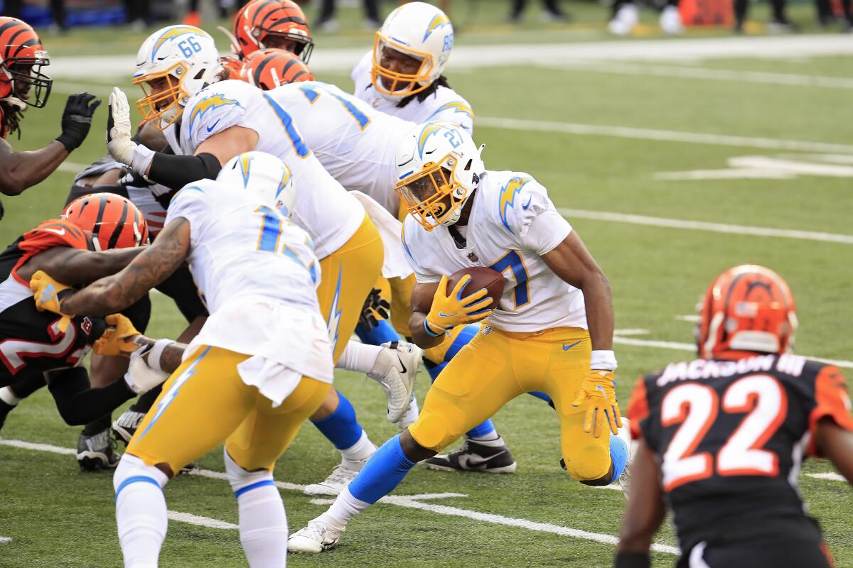 Chargers rookie  Josh Kelley runs for a 5-yard touchdown against the Bengals.