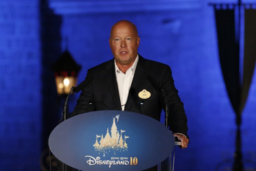 FILE - In this Sept. 11, 2015 file photo, Chairman of Walt Disney Parks and Resorts Bob Chapek speaks during a ceremony at the Hong Kong Disneyland. The Walt Disney Co. has named Chapek CEO, replacing Bob Iger, announced Tuesday, Feb. 25, 2020. (AP Photo/Kin Cheung, File)