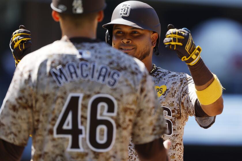 San Diego, CA - May 26: San Diego Padres' Luis Arraez celebrates a RBI single in the sixth inning against the New York Yankees at Petco Park on Wednesday, May 26, 2024. (K.C. Alfred / The San Diego Union-Tribune)