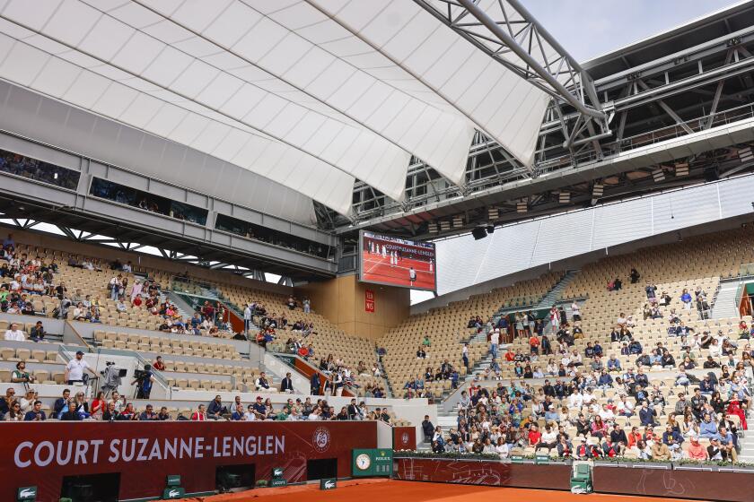 The new roof over Suzanne Lenglen court is seen ahead of first round match of the French Open tennis tournament at the Roland Garros stadium in Paris, Sunday, May 26, 2024. (AP Photo/Jean-Francois Badias)
