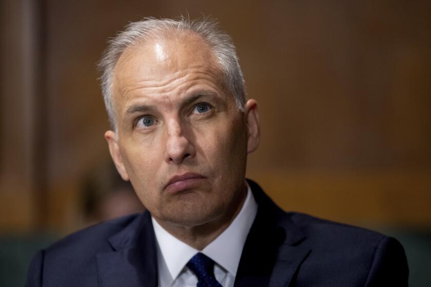 FILE - Matthew G. Olsen, of Maryland, nominee to be an Assistant Attorney General for the Department of Justice, attends a Senate Judiciary Hearing on Capitol Hill in Washington on July 14, 2021. The Justice Department is ending its China Initiative. The move announced Wednesday, Feb. 23, 2022, by Assistant Attorney General Olsen amounts to a rebranding of a Trump-era program that was created to crack down on economic espionage by Beijing but that critics said had unfairly scrutinized Chinese professors on the basis of their ethnicity. (AP Photo/Amanda Andrade-Rhoades, File)