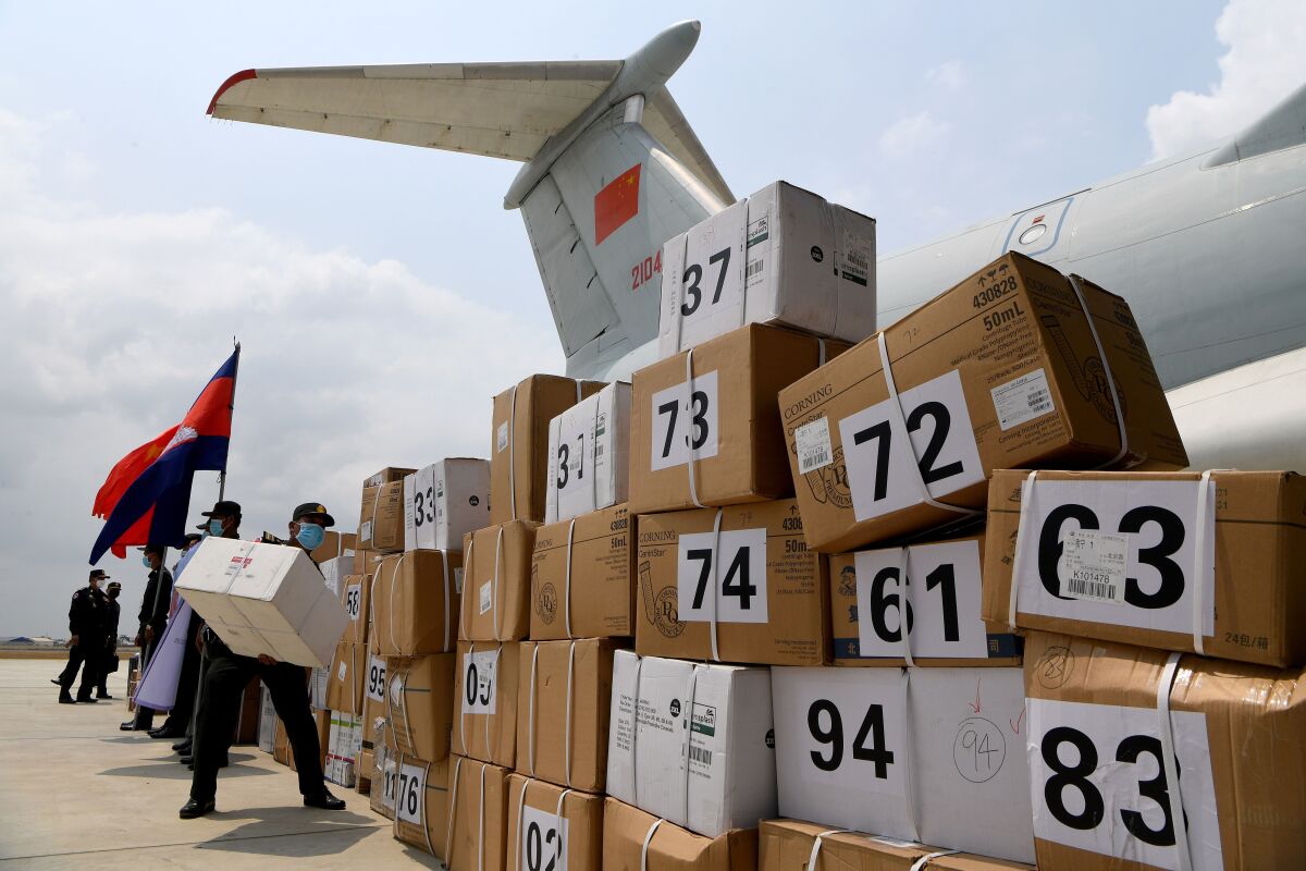 Medical equipment donated by China to combat the coronavirus outbreak arrives at Phnom Penh International Airport in Cambodia.
