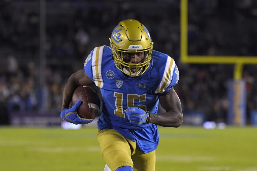 UCLA wide receiver Jaylen Erwin runs in for a touchdown during the first half of an NCAA college football game against California Saturday, Nov. 30, 2019, in Pasadena, Calif. (AP Photo/Mark J. Terrill)