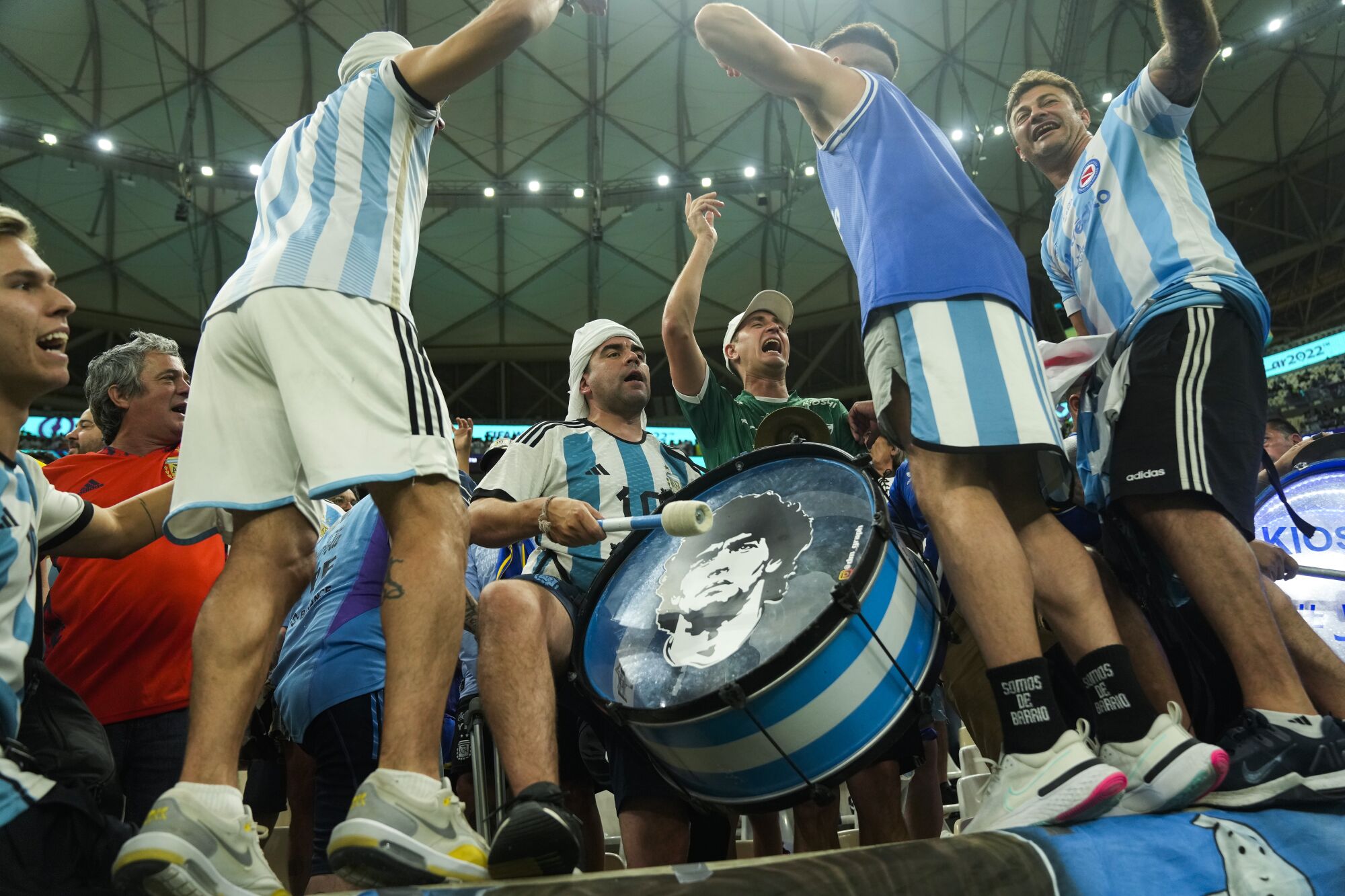 Argentinian supporters cheer up a