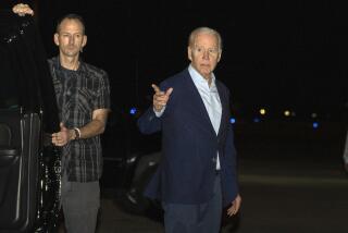 President Joe Biden arrives at Henry E. Rohlsen Airport, in St. Croix, U.S. Virgin Islands, late Tuesday, Dec. 27, 2022. Biden and his family are traveling to St. Croix to celebrate the New Year. (AP Photo/Manuel Balce Ceneta)