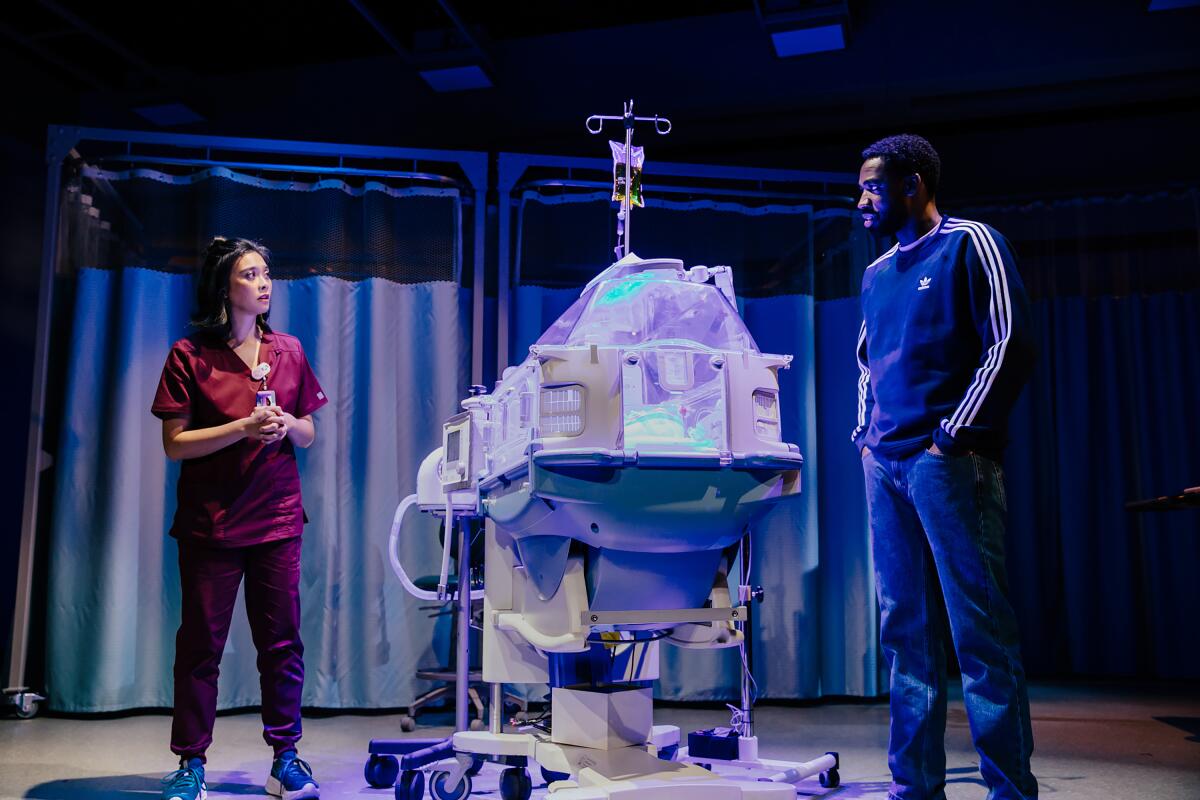 Tiffany Villarin, left, and Maurice Williams in "tiny father" at Geffen Playhouse.