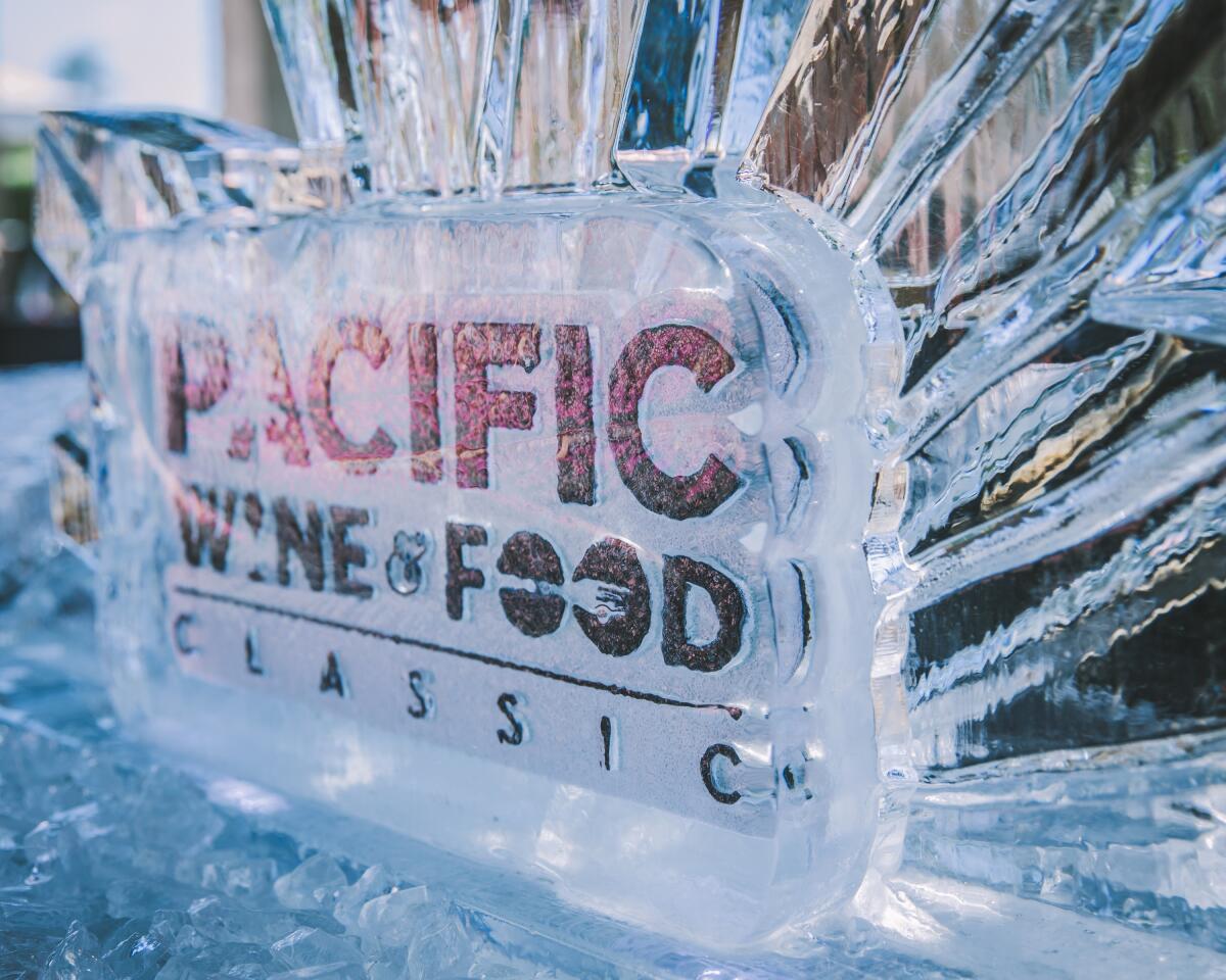 an ice sculpture sign reading Pacific Wine & Food Classic