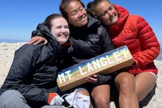 Eline Oidvin, center, at the summit of Mount Langley with guides Ellen MacNary, left, and Therese Nordbo. Oidvin, blind since birth, was making her first high mountain trek.