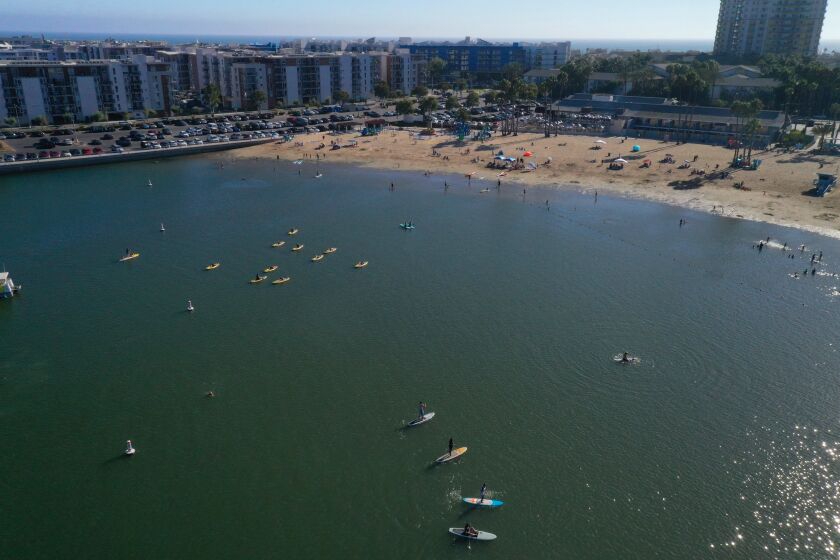 Marina del Rey, California-Aug. 8, 2020-Summer activities at Mother's Beach in Marina del Rey, California on Aug. 8, 2020. (Carolyn Cole/Los Angeles Times)