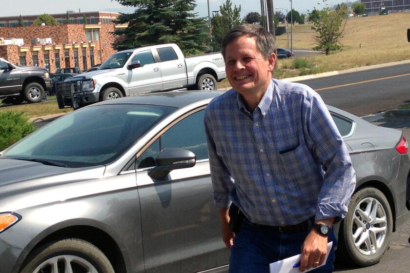 U.S. Rep. Steve Daines arrives for a meeting in Helena, Mont., on Aug. 7 after learning that John Walsh, his opponent in the race for U.S. Senate, was dropping out of the contest.