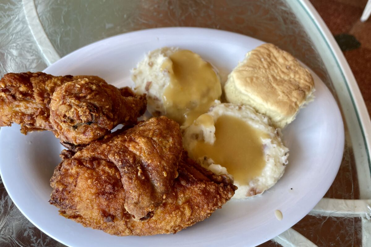 Fried chicken with double mashed potatoes and a biscuit from Plaza Inn at Disneyland