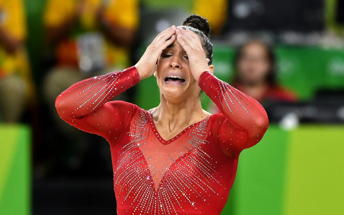 U.S. gymnast Aly Raisman reacts following the conclusion of her floor exercise.