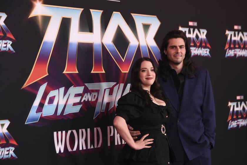 Kat Dennings, left, and Andrew W.K. arrive at the premiere of "Thor: Love and Thunder" on Thursday, June 23, 2022, at the El Capitan Theatre in Los Angeles. (Photo by Jordan Strauss/Invision/AP)