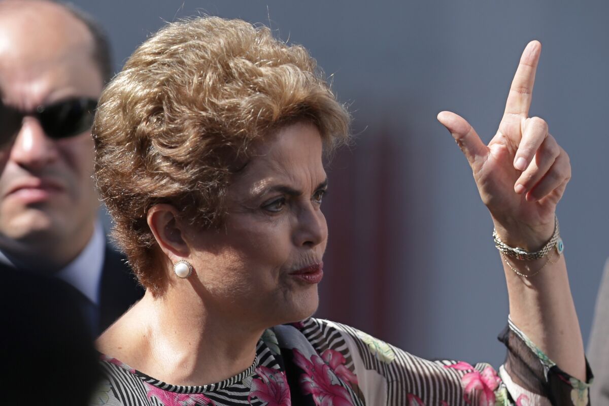 Brazil’s President Dilma Rousseff speaks during a visit to ground infrastructure works for the 2016 Olympic Games on March 23.