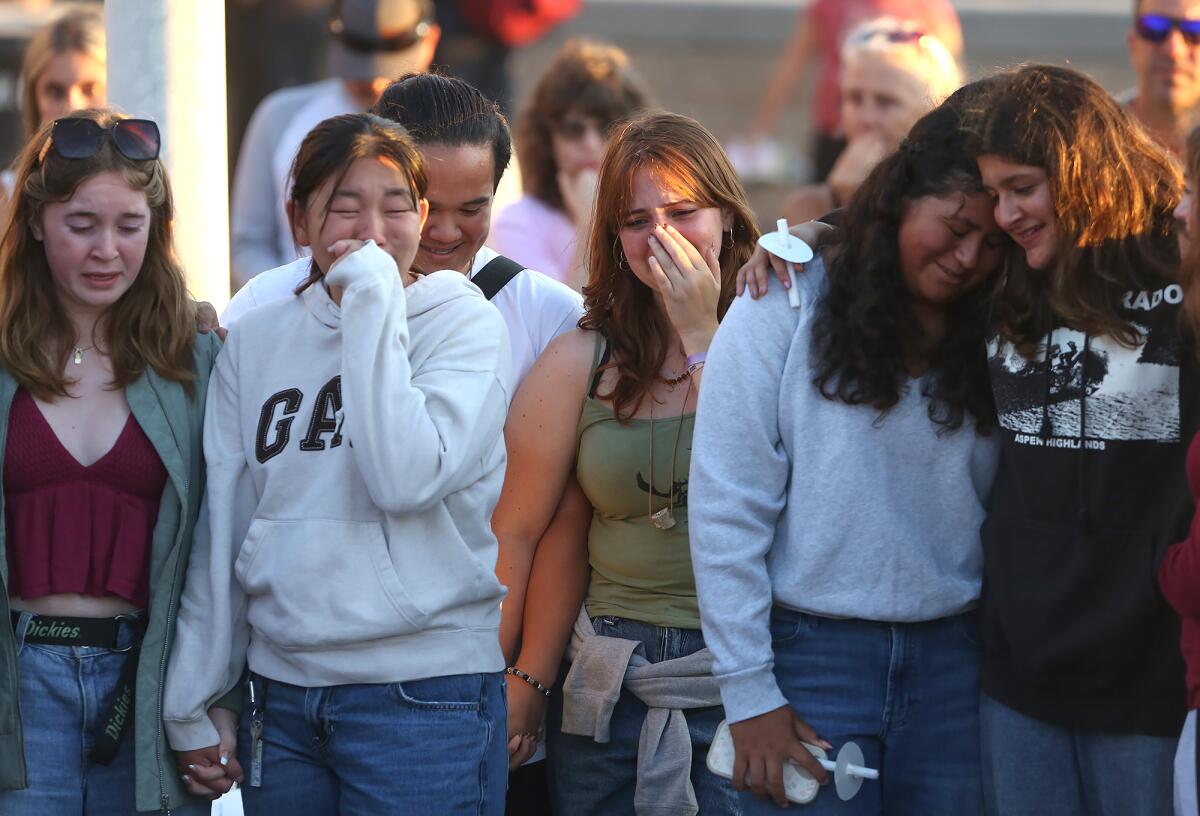 Friends gathered to remember 15-year-old Aayan Randhawa at a candlelight vigil on Tuesday night.