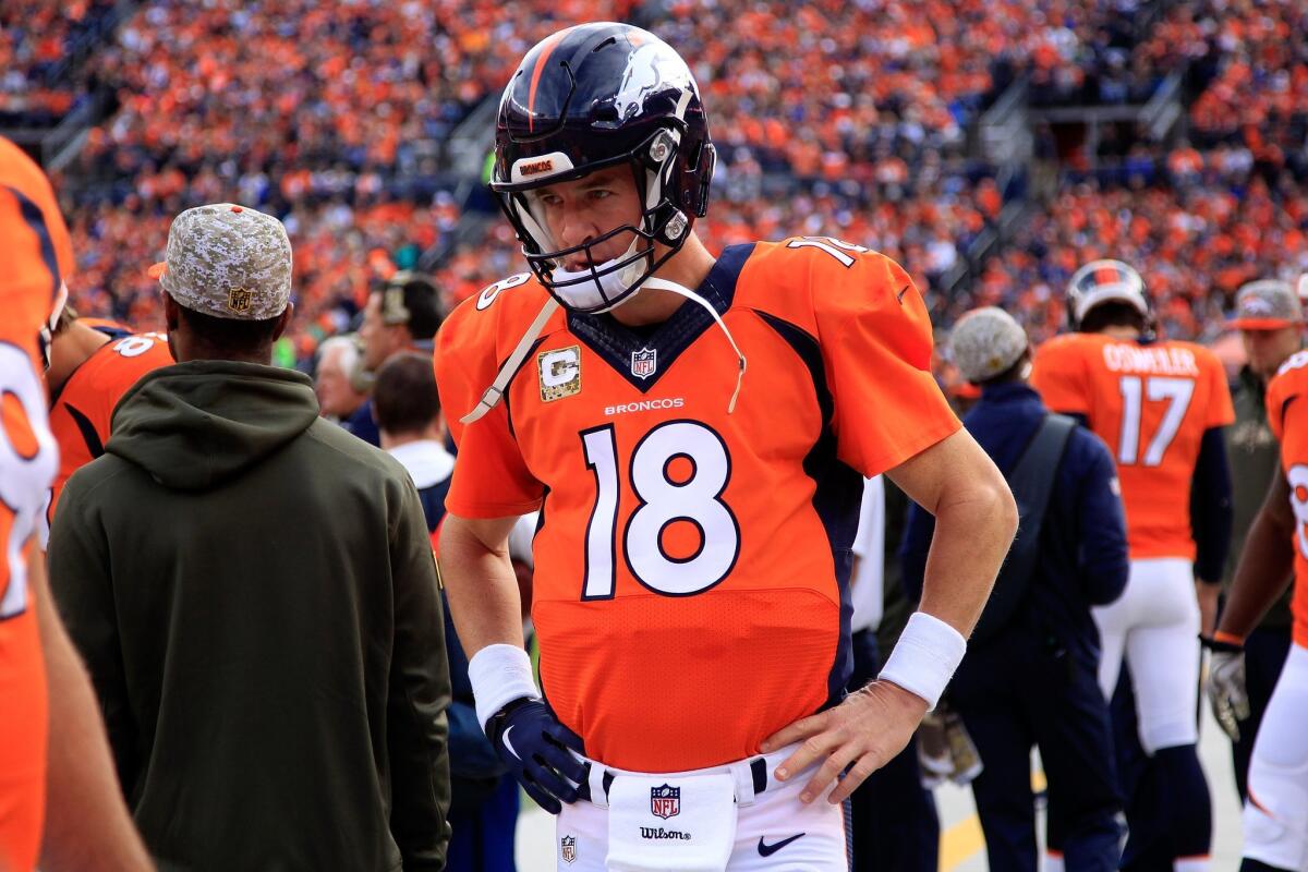 Denver quarterback Peyton Manning prepares to take the field against Kansas City on Sunday.
