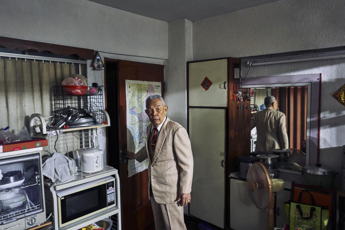 Mei You-nian, 87, shown at his home in Taipei, Taiwan, says: “People’s Republic or Republic of China — aren’t they all China in the end? We’re one family. We’re all Chinese."