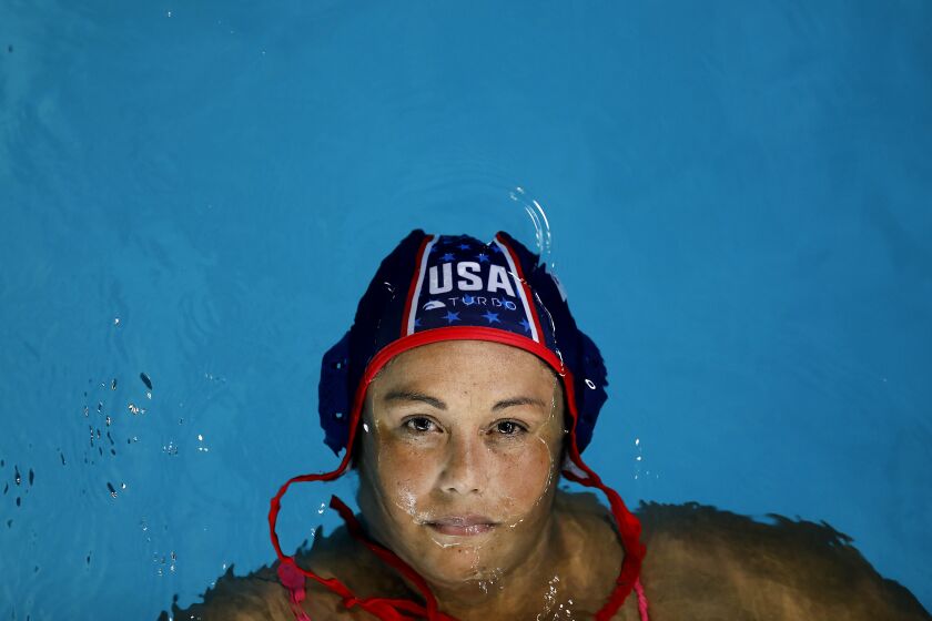 *******DO NOT USE***** FOR WOMENS SPECIAL SECTION RUNNING MARCH 8********COMMERCE-CA-DECEMBER 3, 2019: Brenda Villa is photographed at the Brenda Villa Aquatic Center in Commerce, California on Tuesday, December 3, 2019. (Christina House / Los Angeles Times)