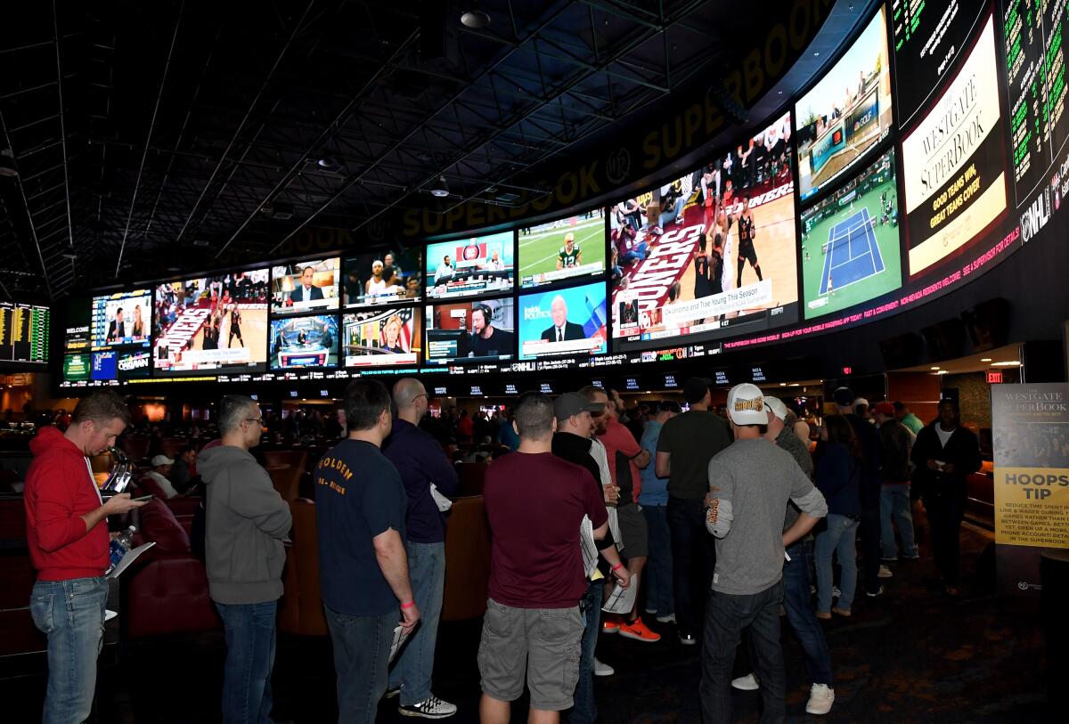 Guests line up to place bets at the Westgate Las Vegas resort and casino in Las Vegas. 