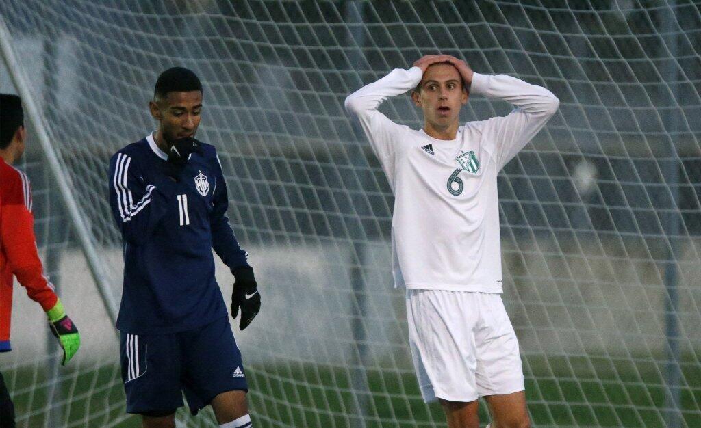 Edison's Kobe Wood reacts after just missing a shot on goal against Newport Harbor.