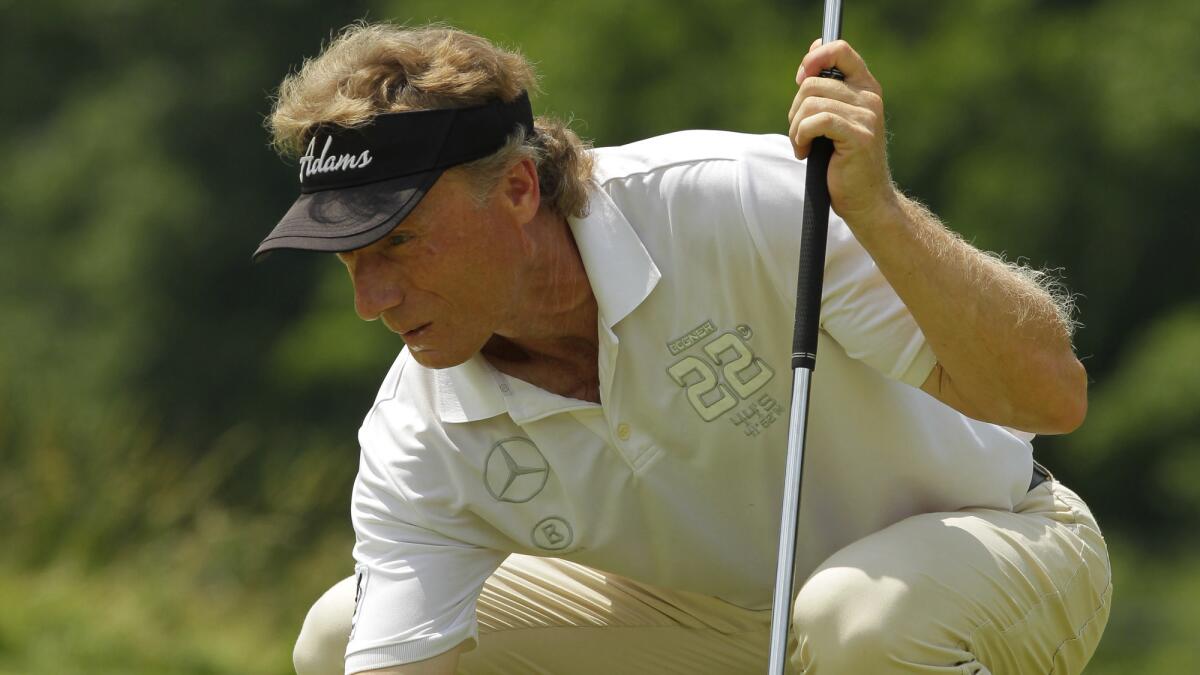 Bernhard Langer lines up his putt on the seventh green during the third round of the Seniors Players Championship at Fox Chapel Golf Club in Pittsburgh on Saturday.