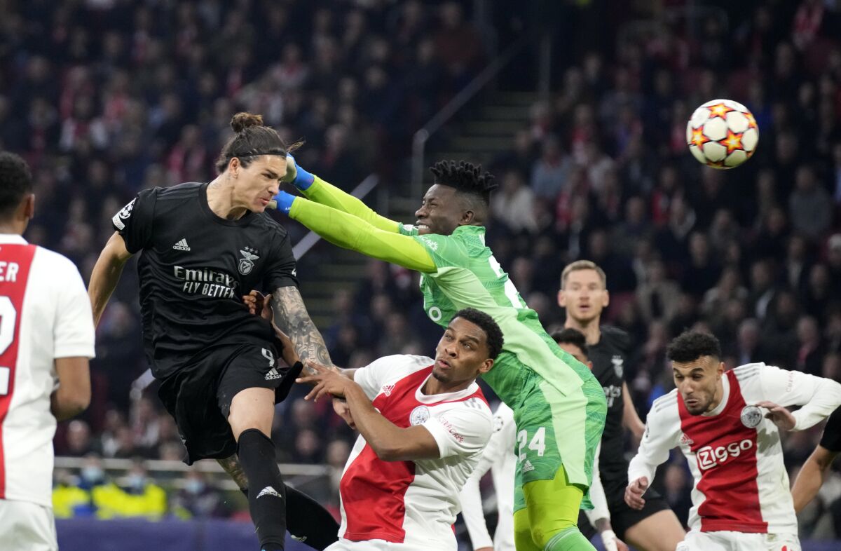 Benfica's Darwin Nunez scores his side's opening goal during the Champions League, round of 16, second leg soccer match between Ajax and Benfica at the Johan Cruyff ArenA in Amsterdam, Netherlands, Tuesday, March 15, 2022. (AP Photo/Peter Dejong)