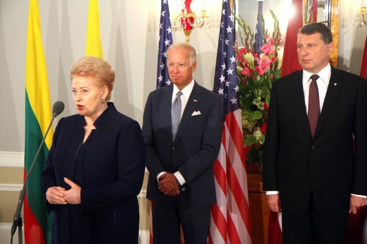 Vice President Joe Biden stands between Lithuanian President Dalia Grybauskaite and Latvian President Raimonds Vejonis, in Riga, Latvia, on Tuesday. Biden met with Baltic state leaders ahead of traveling to Turkey.