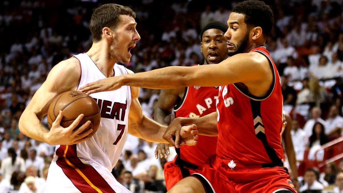 Raptors guard Cory Joseph tries to stop Heat guard Goran Dragic, who finished with 30 points in Game 6 on Friday night.