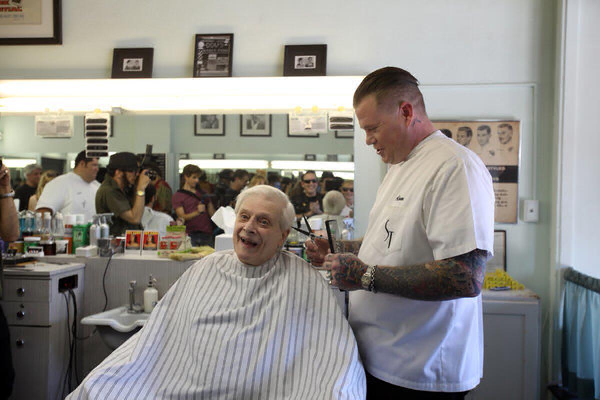 Writer Harlan Ellison has his hair cut at Sweeney Todd's Barber Shop before his Hollywood book signing.