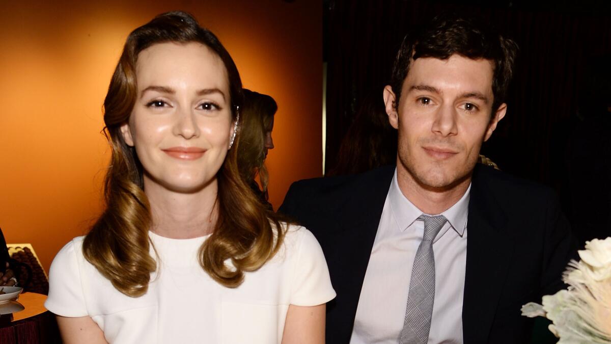 Leighton Meester and Adam Brody, pictured in June 2014, appear to be expecting their first child. She's been photographed sporting what looks to be a baby bump.