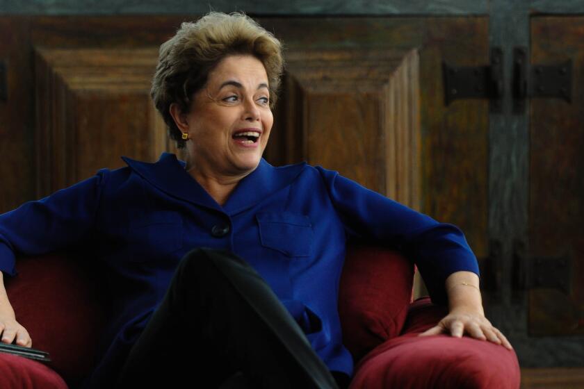 Dilma Rousseff, the suspended president of Brazil, laughs during an interview in the presidential residence.
