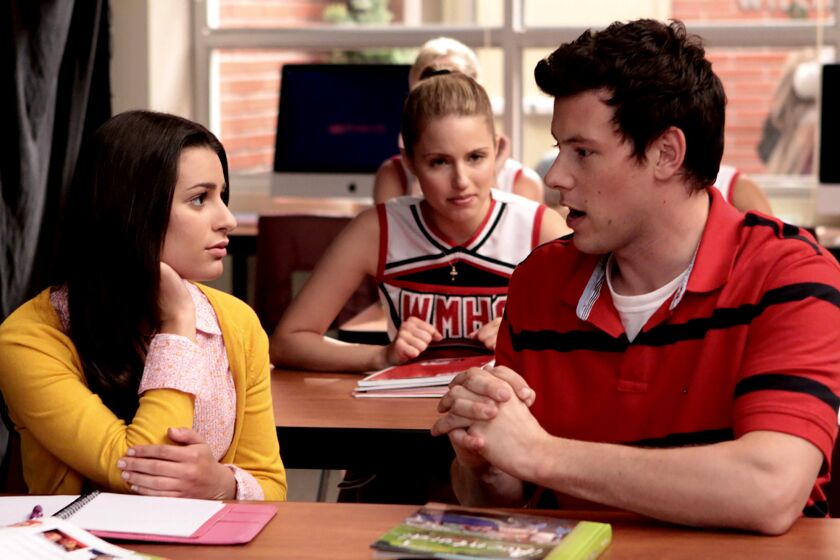 GLEE -- Fox TV Series, Quinn (Dianna Agron, C) is upset when she sees her boyfriend Finn (Cory Monteith, R) and Rachel (Lea Michele, L) chat in class in the "Throwdown" episode of GLEE airing Wednesday, Oct. 14 (9:00-10:00 PM ET/PT) on FOX. ©2009 Fox Broadcasting Co. CR: Carin Baer/FOX