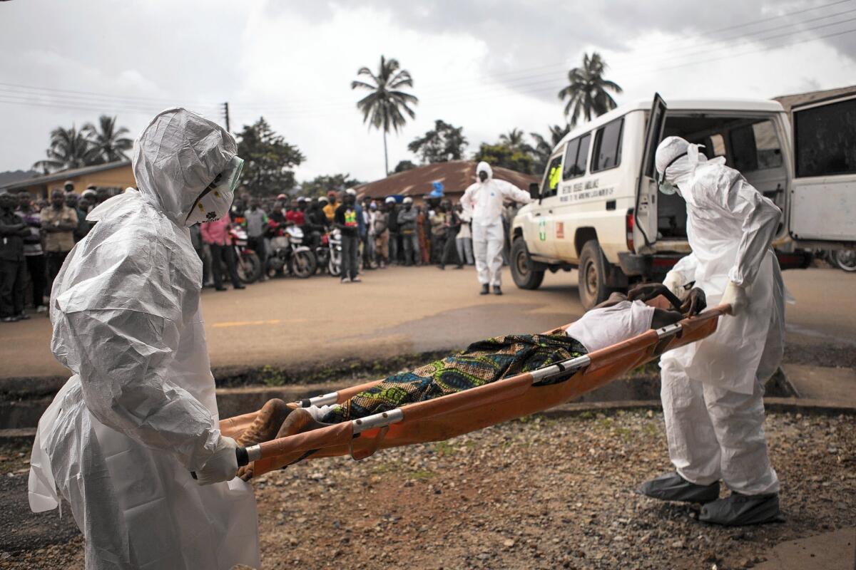 A presidential panel recommends public health organizations use "the least restrictive means necessary" when monitoring volunteers returning from treating Ebola patients in Africa.