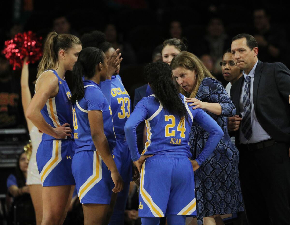 UCLA coach Cori Close talks to her team during a timeout in a game against USC on Jan. 17 at the Galen Center.