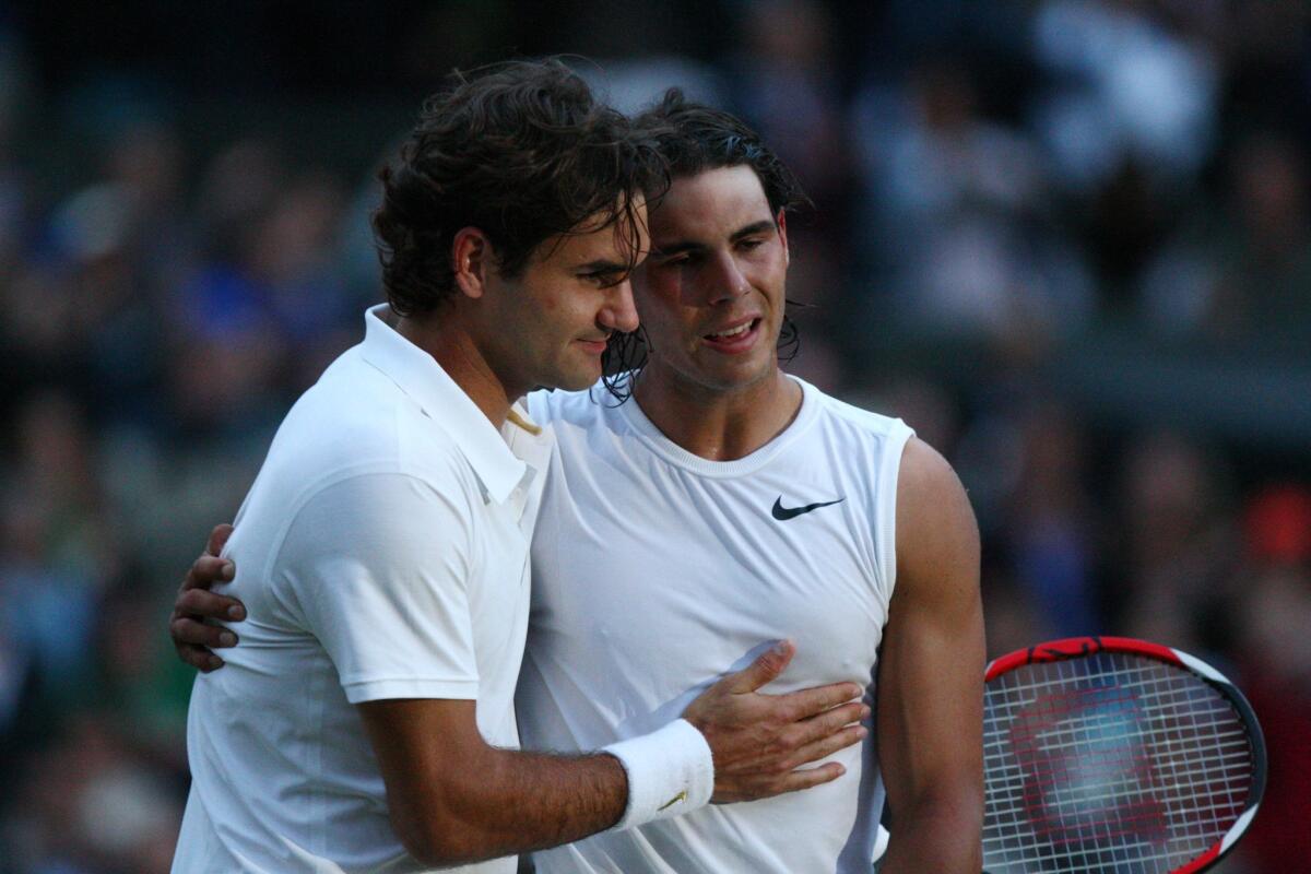 Spain's Rafael Nadal, right, is congratulated by Switzerland's Roger Federer after winning the 2008 Wimbledon final.