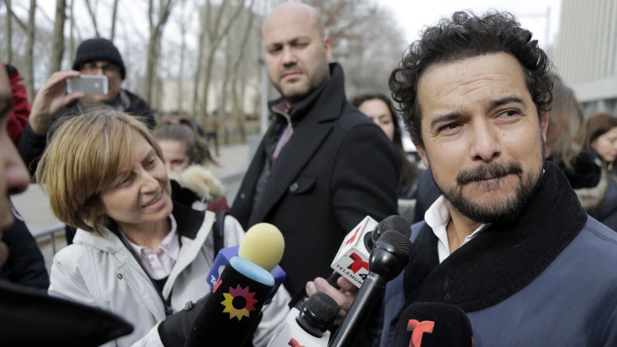 Actor Alejandro Edda, who has portrayed Joaquin "El Chapo" Guzman, talks to reporters outside the drug kingpin's trial in New York on Monday.