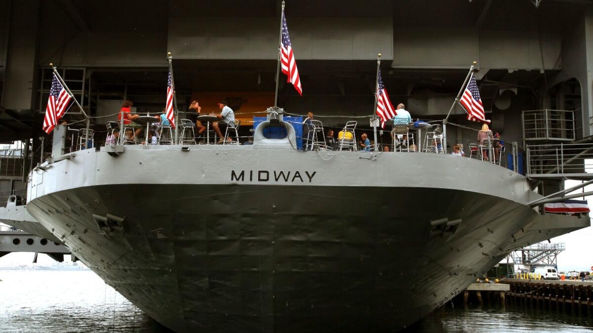 Children receive free admission to San Diego attractions in October, including the Midway Museum, a former U.S. aircraft carrier.