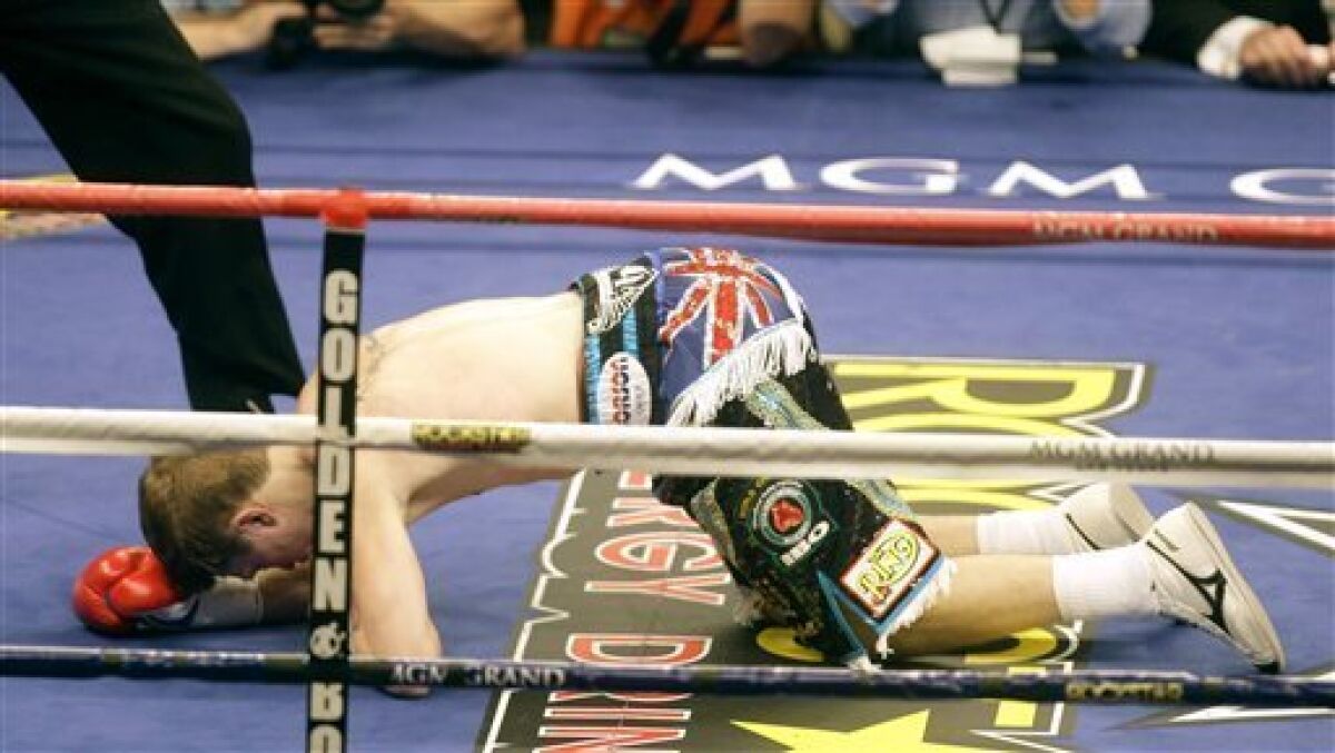 British boxer Ricky Hatton hits the mat after he was knocked down by Manny Pacquiao, of the Philippines, during the first round of their junior welterweight boxing match Saturday, May 2, 2009, in Las Vegas. Pacquiao won the fight by TKO in the second round. (AP Photo/Rick Bowmer)