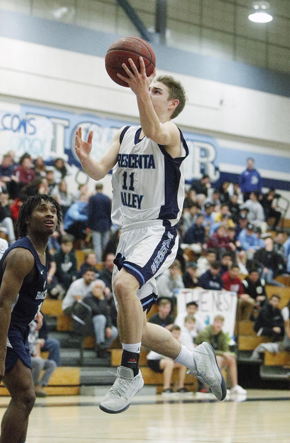 Crescenta Valley High boys' basketball player Tyler Carlson was named the Pacific League's co-Most Valuable player after averaging 22.1 points per game this season.