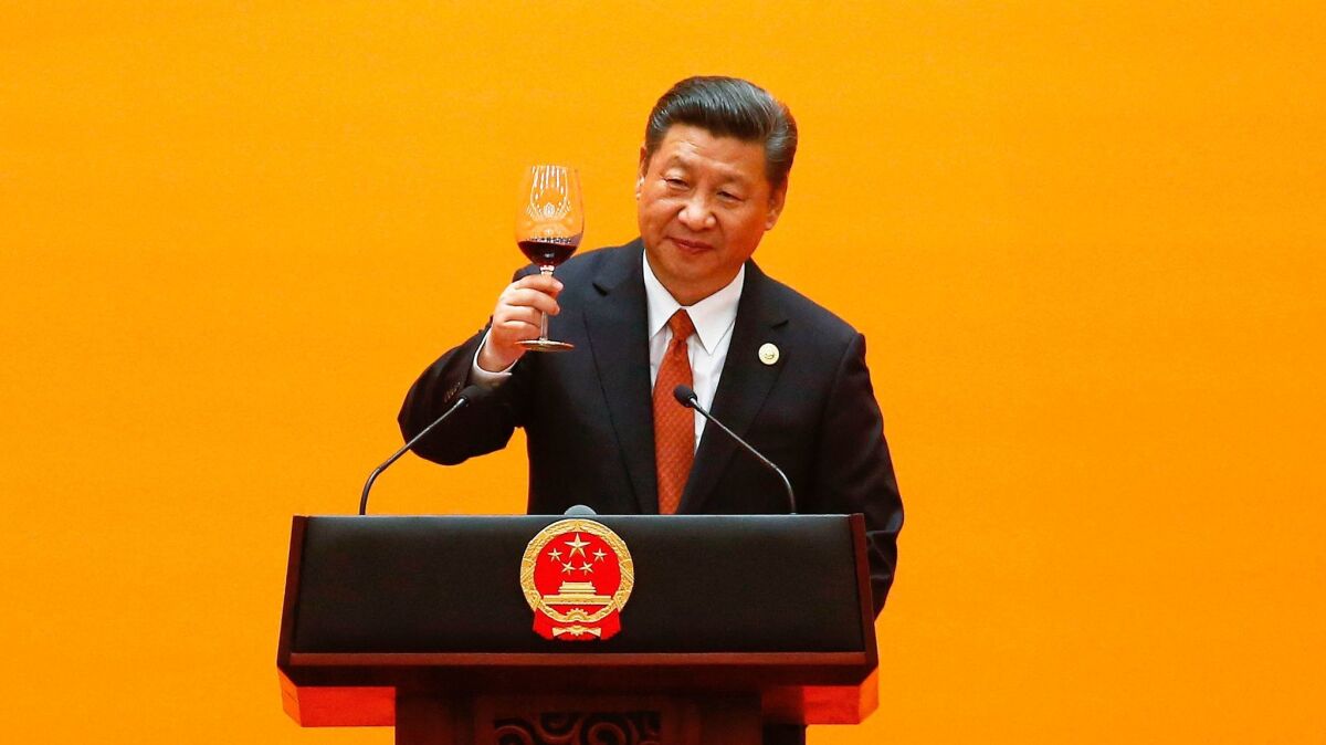 Chinese President Xi Jinping makes a toast at the beginning of the welcoming banquet at the Great Hall of the People during the first day of the Belt and Road Forum in Beijing on May 14, 2017.