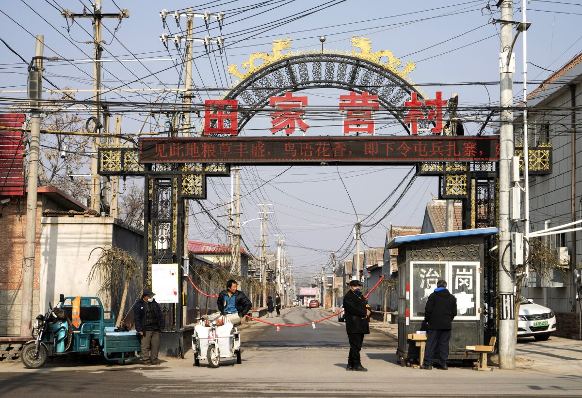 Entry to Tianjiaying village in the suburbs of Beijing is barred amid the spreading coronavirus.