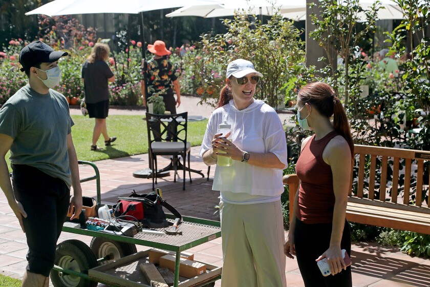 Jennifer Backhaus, center, with Kaitlin Regan, right, and Joao Ducci, during a rehearsal Thursday at Sherman Gardens.