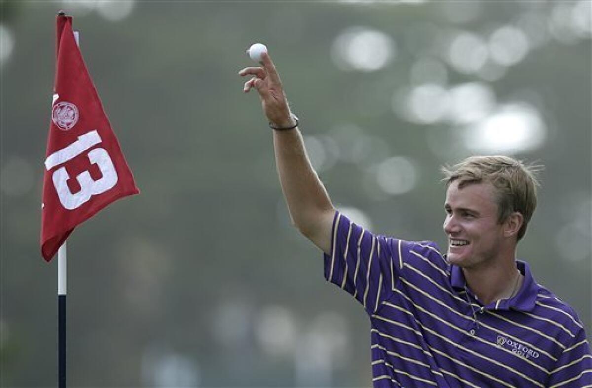John Peterson reacts after his hole-in-one on the 13th hole during the third round of the U.S. Open on June 16, 2012, in San Francisco.