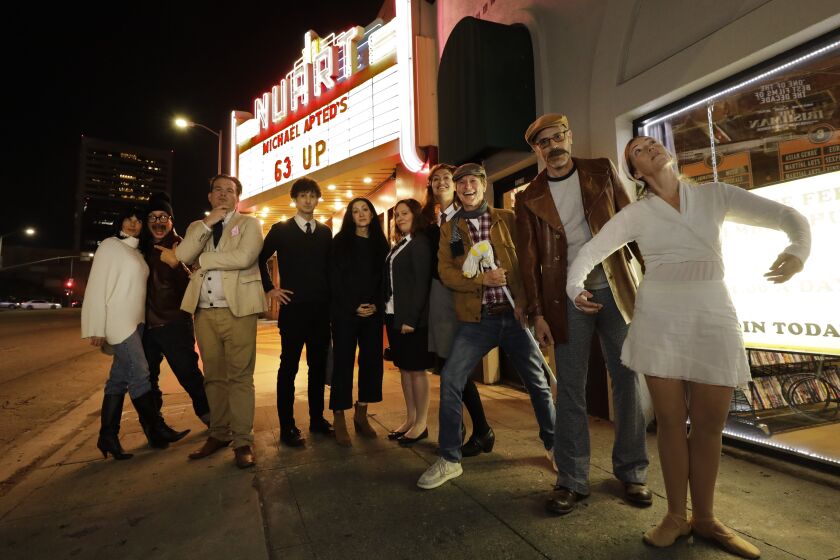 LOS ANGELES, CA -- DECEMBER 12, 2019: Left to right dressed as characters from Michael Apted’s film series “Up” are: Jessica Benton, Timbo Teuxsheux (cq), C. Brian Smith, Gabe Diani (cq), Annabelle Gurwitch, Etta Devine, Maggie Rowe, Jim Vallely (cq), Jack Rudy and Susie McDonnell. Actress/writer Annabelle Gurwitch and this group of her friends have been catching up on Michael Apted’s documentary watching one film a week for the past several weeks to the current “63 Up.” The documentary visits the subjects of the film every seven years. (Myung J. Chun / Los Angeles Times)